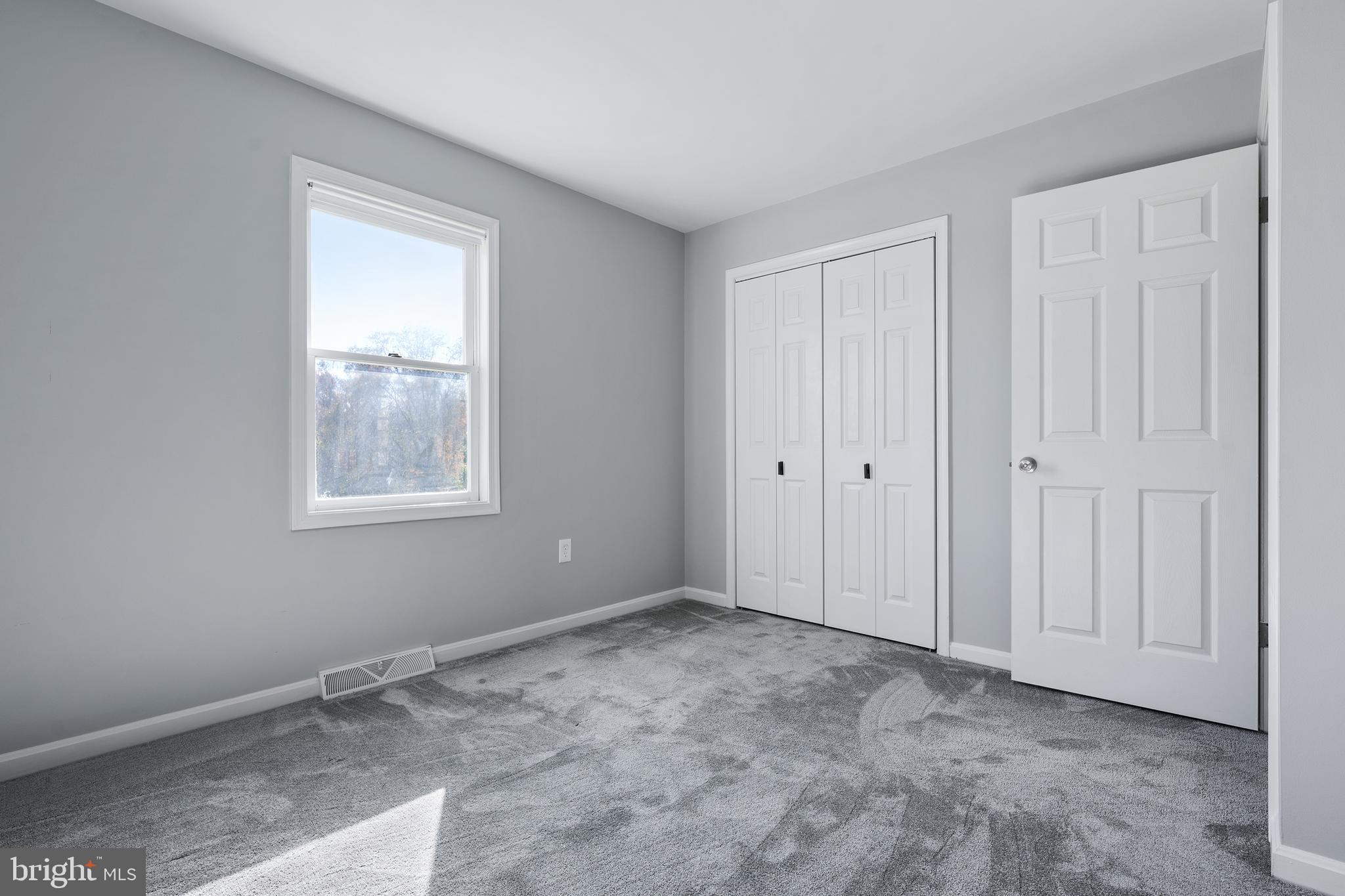 4956 East Berlin Road Thomasville, PA 17364 - Photo 24 of 31 a view of an empty room with a window