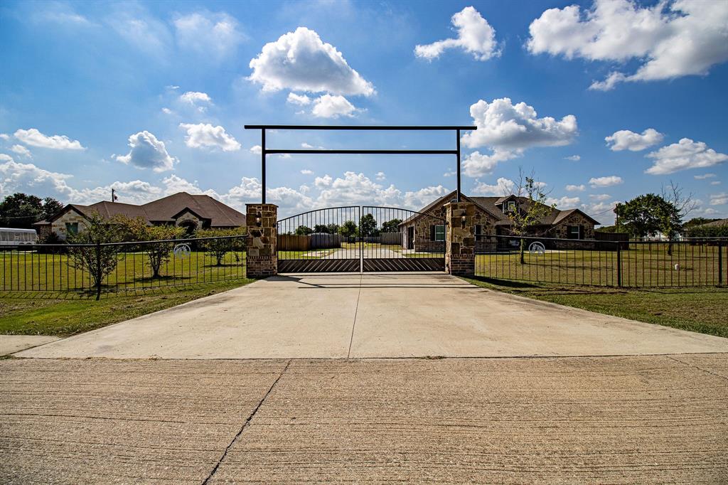 328 Meadow Lane Red Oak, TX 75154 - Photo 25 of 35 Gate with a fenced front yard
