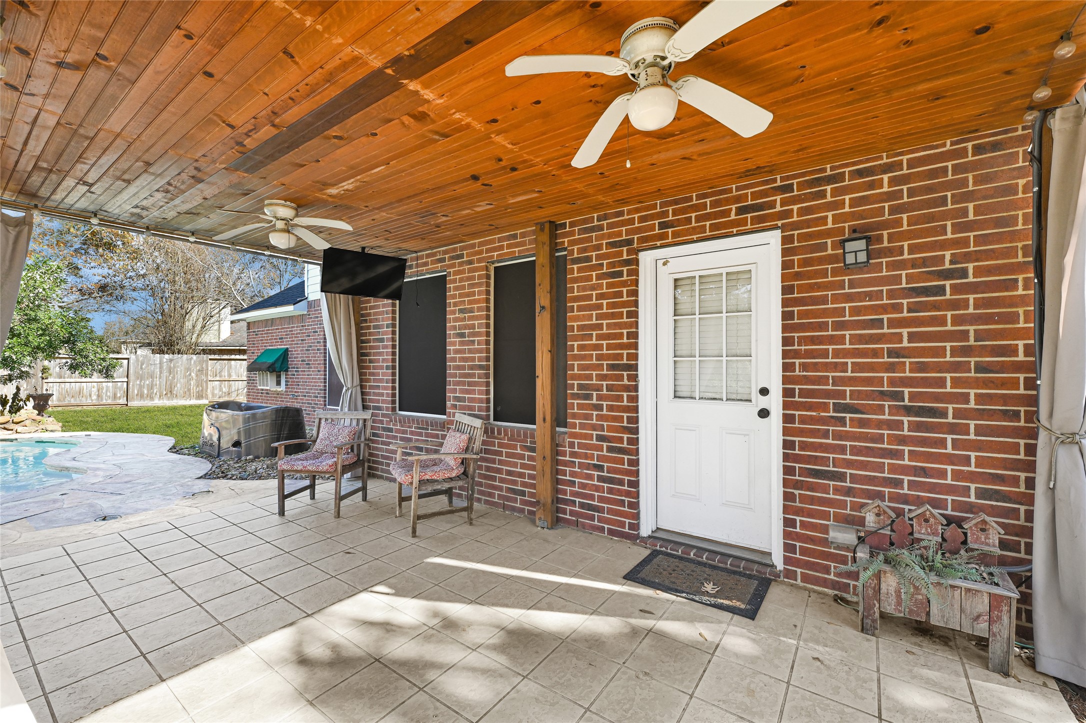 12902 Chalfield Circle Houston, TX 77044 - Photo 29 of 36 outdoor covered patio exiting back door