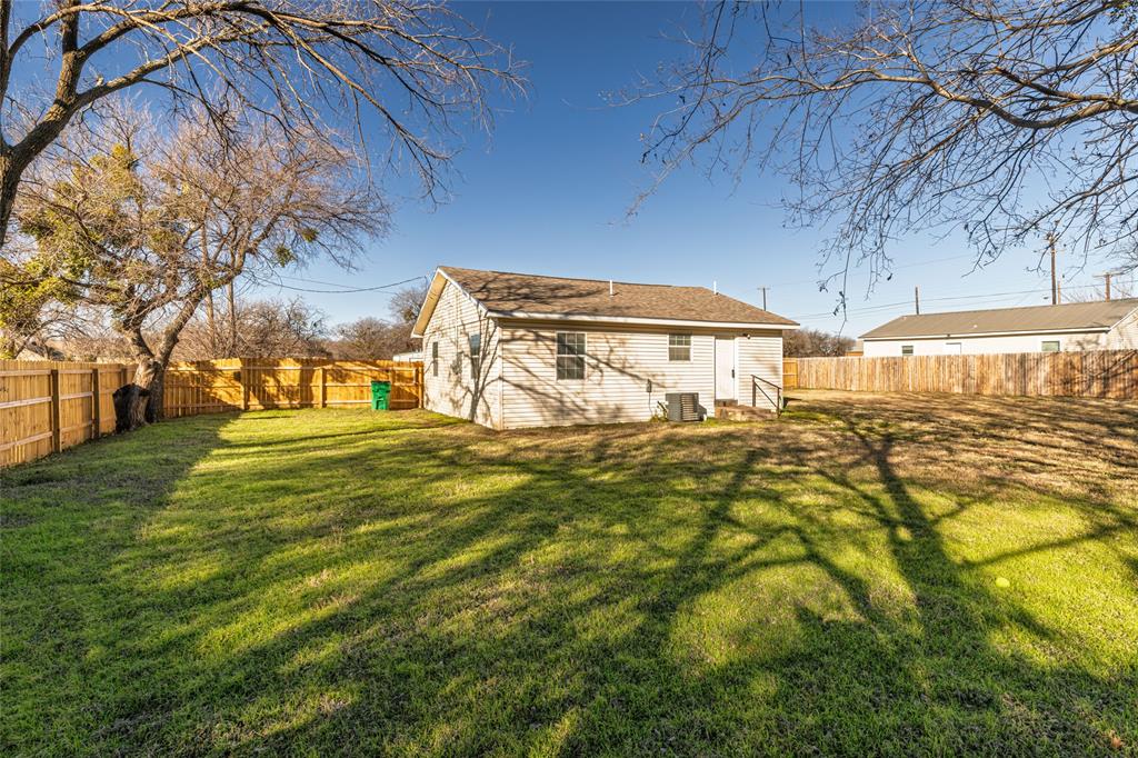 205 Highway 101 Chico, TX 76431 - Photo 1 of 29 Lovely back yard! And huge!