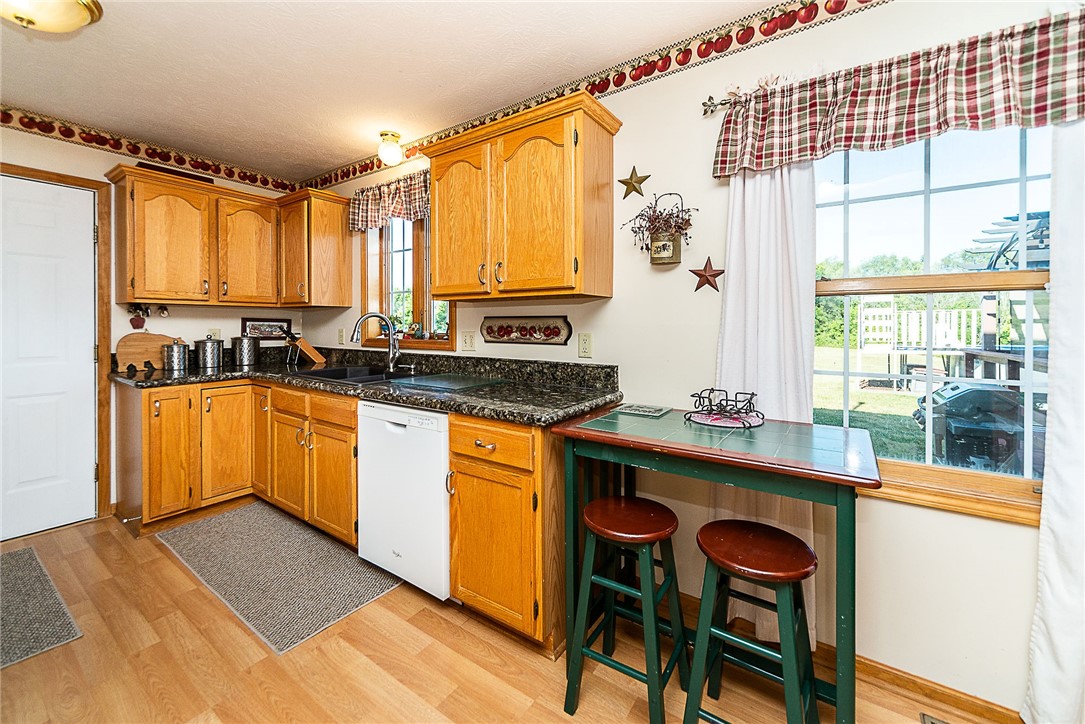 10164 Creek Road Pavilion, NY 14525 - Photo 8 of 34 Kitchen with granite counter
