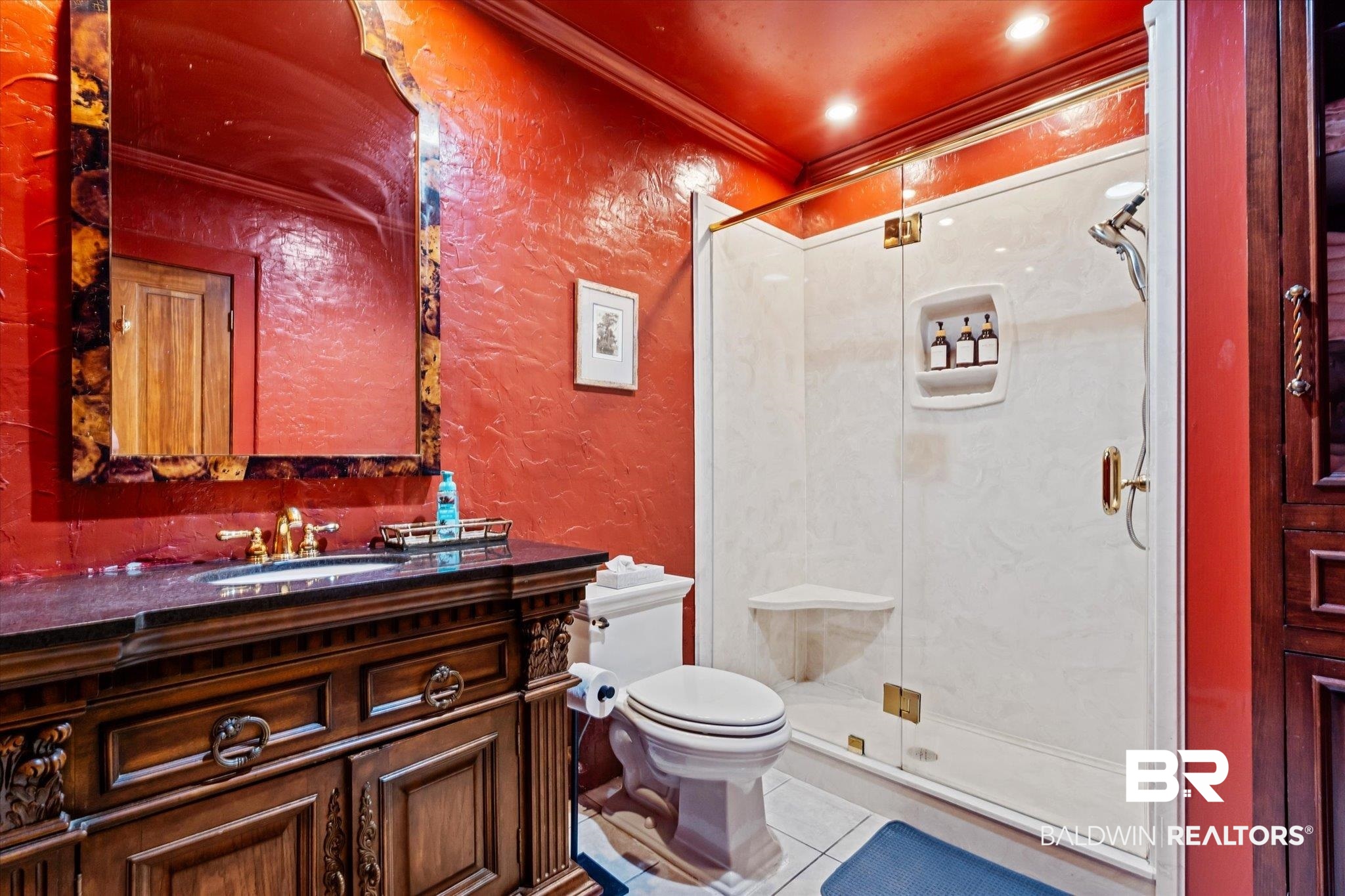 2228 Riverside Drive Mobile, AL 36605 - Photo 29 of 51 Bathroom featuring toilet, an enclosed shower, tile patterned floors, ornamental molding, and vanity