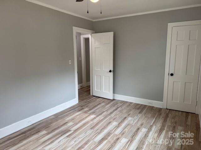 509 North Ransom Street Gastonia, NC 28052 - Photo 7 of 12 a view of an empty room with wooden floor