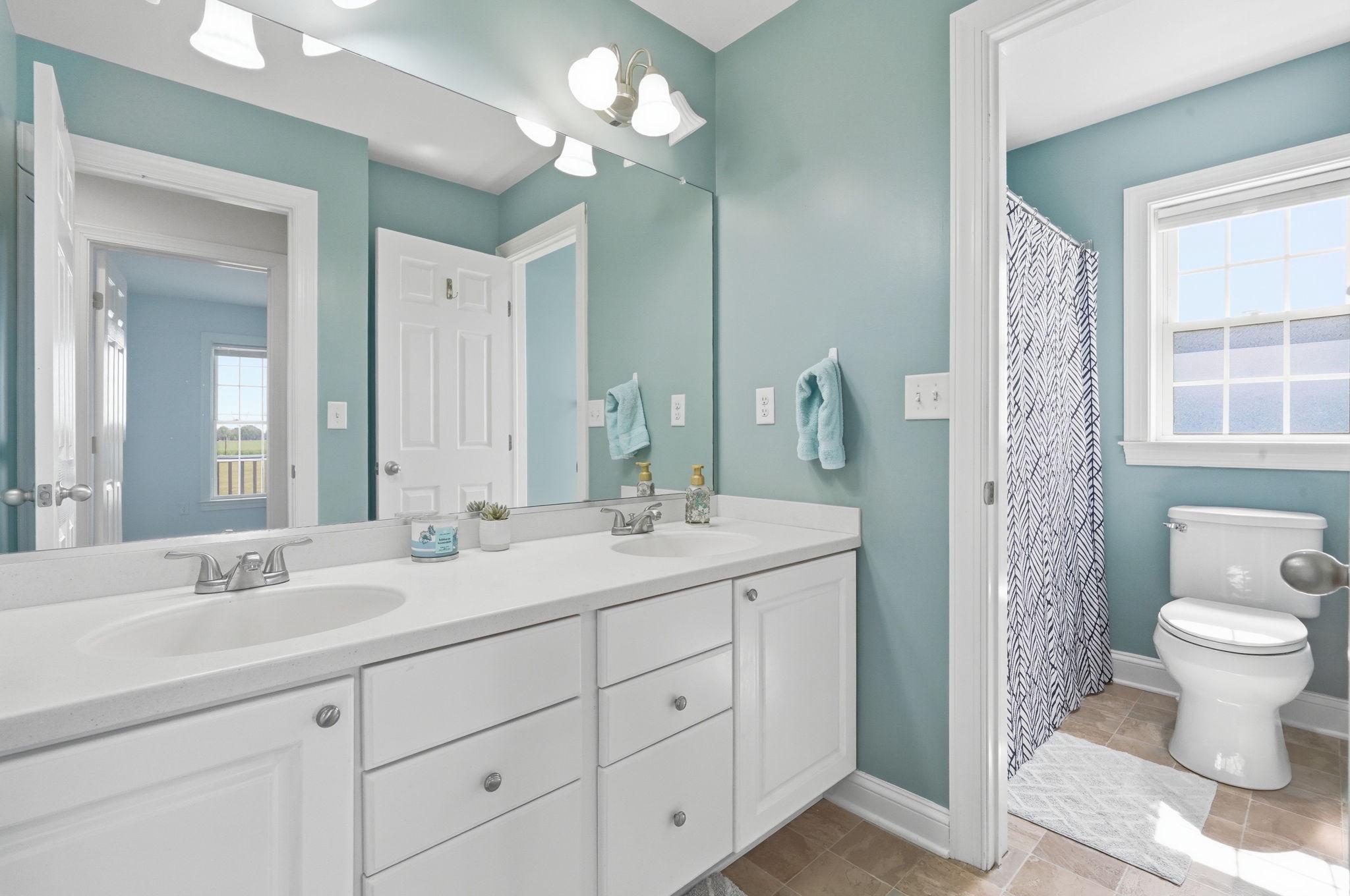 615 Ell Downes Road Henderson, MD 21640 - Photo 24 of 58 First floor full bath with double vanity