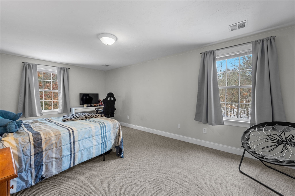 1 Anthony's Way Mashpee, MA 02649 - Photo 20 of 42 a bedroom with a bed and a couch