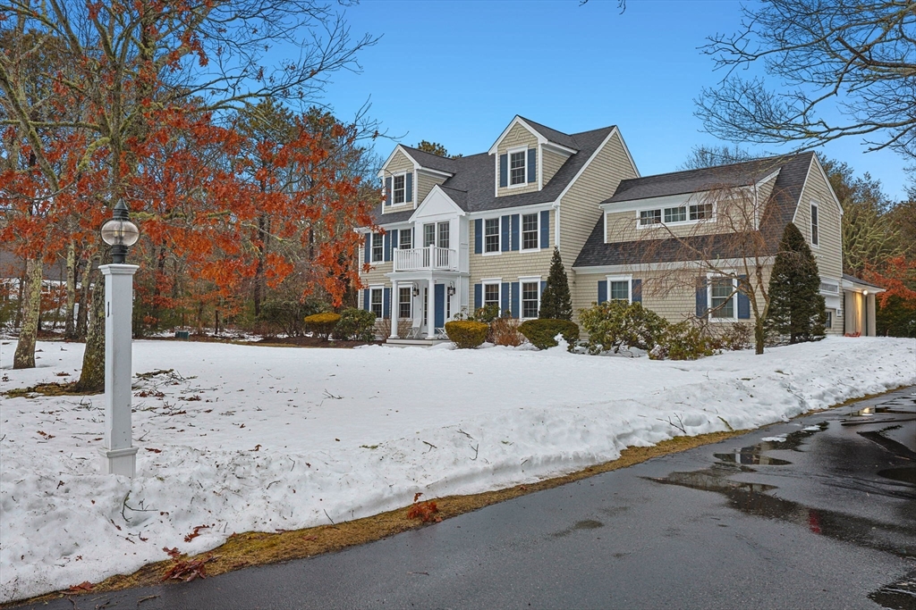 1 Anthony's Way Mashpee, MA 02649 - Photo 2 of 42 a front view of a house with a yard