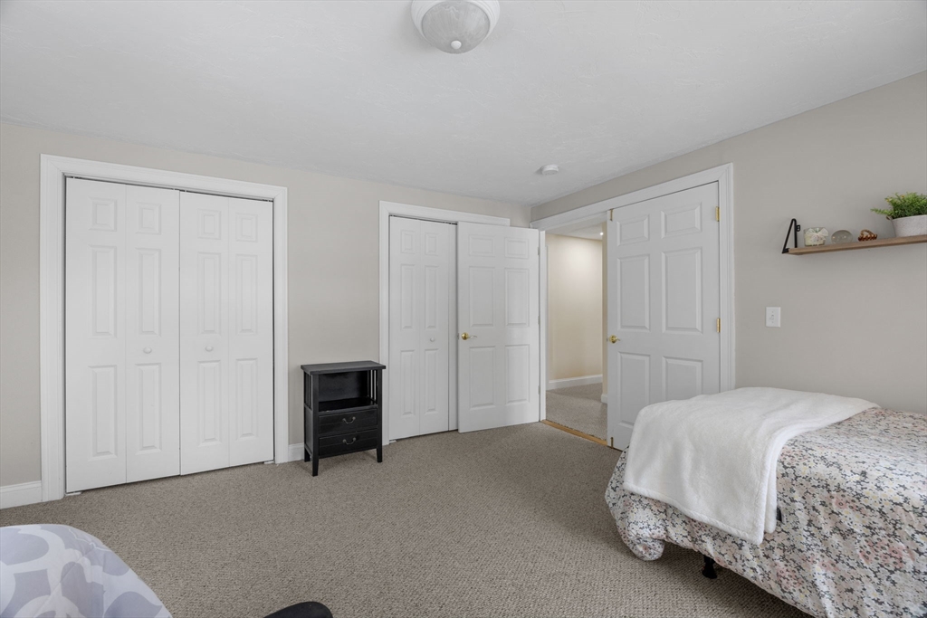 1 Anthony's Way Mashpee, MA 02649 - Photo 24 of 42 a bedroom with a bed and a closet