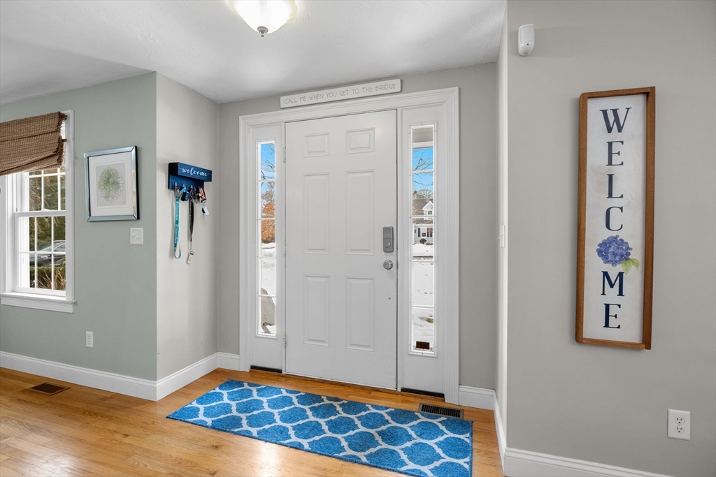 1 Anthony's Way Mashpee, MA 02649 - Photo 3 of 42 a view of room with window and wooden floor