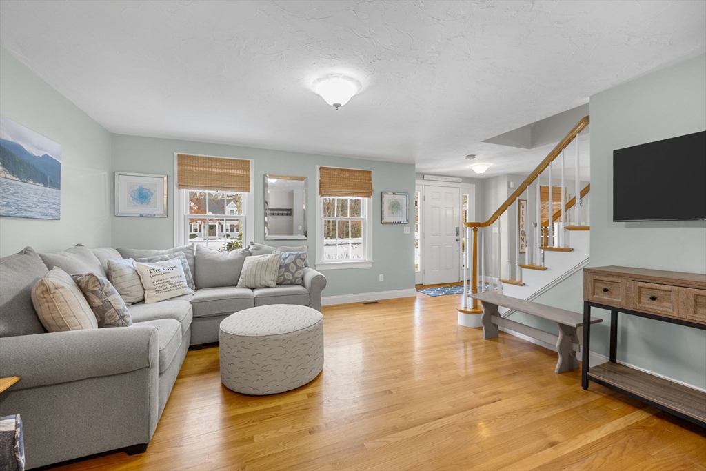 1 Anthony's Way Mashpee, MA 02649 - Photo 5 of 42 a living room with furniture and a flat screen tv