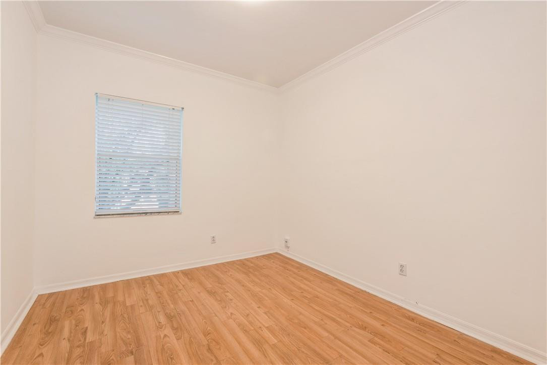 16135 Emerald Cove Road Weston, FL 33331 - Photo 12 of 17 Bedroom #3 has built in closet cabinetry