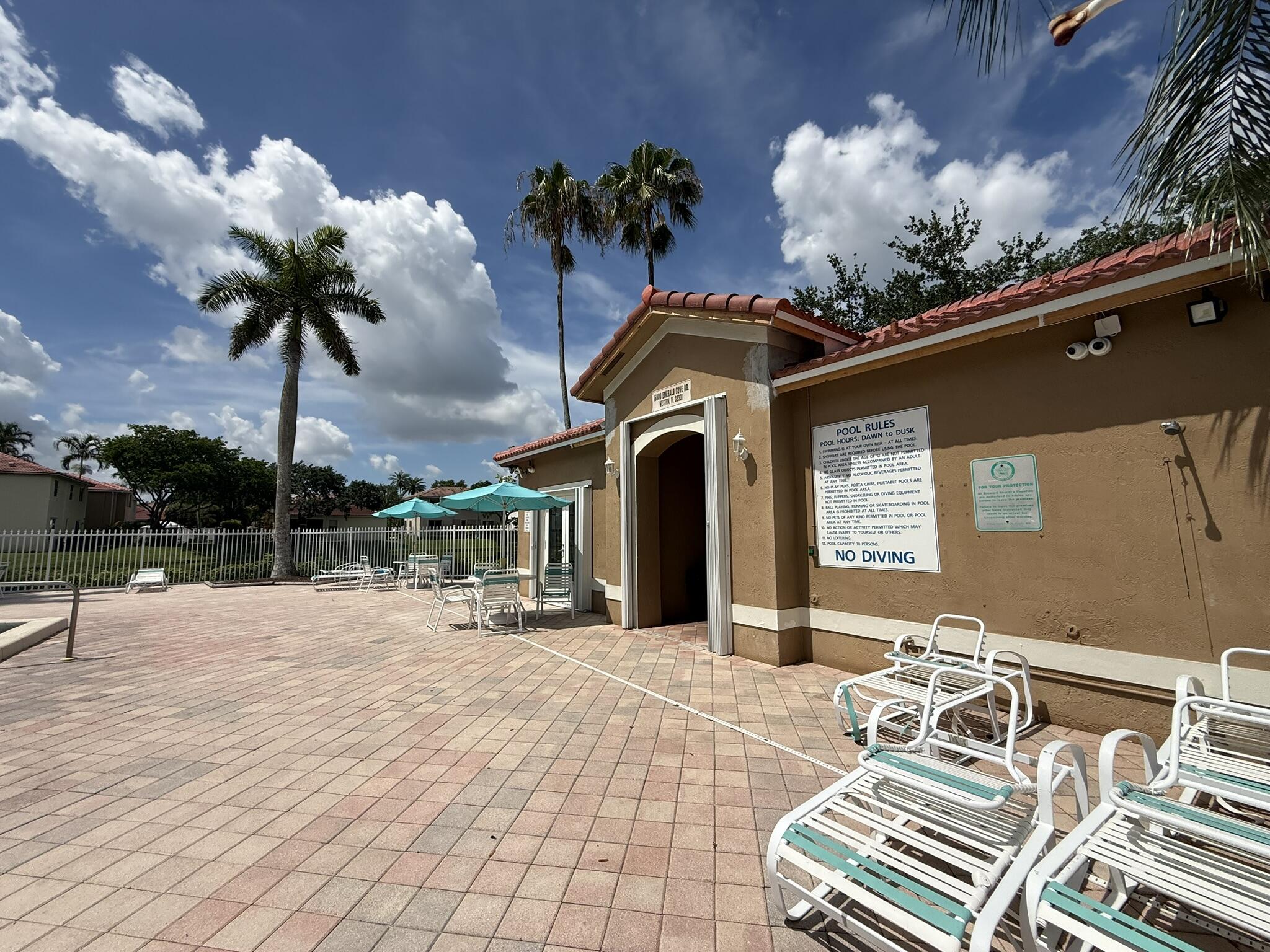 16135 Emerald Cove Road Weston, FL 33331 - Photo 17 of 22 a view of a lobby with a garden