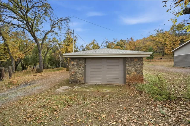 a view of a backyard of the house