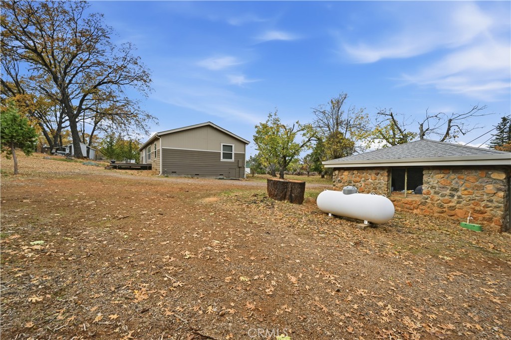 13035 Anderson Road Lower Lake, CA 95457 - Photo 31 of 39 a front view of a house with a yard
