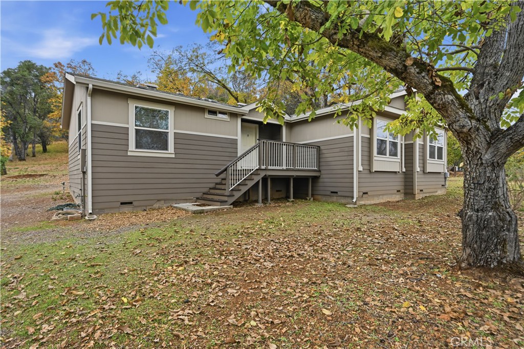 13035 Anderson Road Lower Lake, CA 95457 - Photo 32 of 39 front view of a house with a large tree