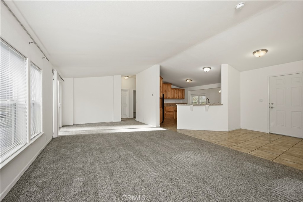13035 Anderson Road Lower Lake, CA 95457 - Photo 9 of 39 a view of a big room with wooden cabinet and windows