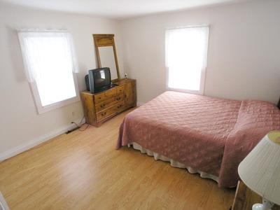 188 Captain Chase Road Dennis Port, MA 02639 - Photo 13 of 14 a bedroom with a bed and window