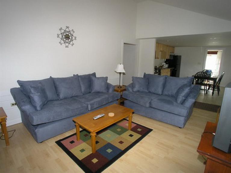 188 Captain Chase Road Dennis Port, MA 02639 - Photo 4 of 14 a living room with furniture and a couch