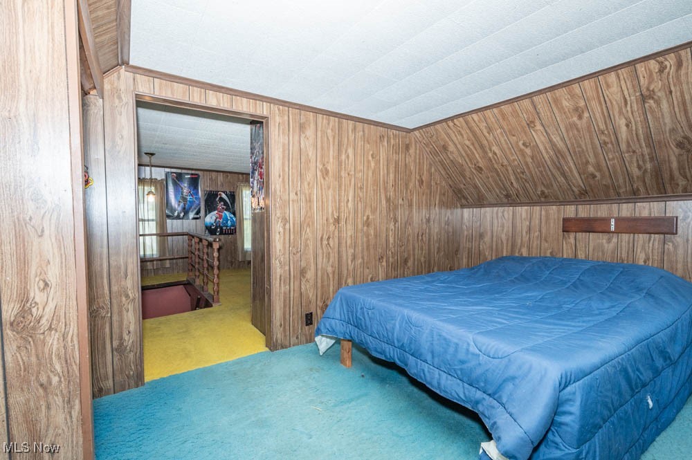 103 Valley Road Damascus, OH 44619 - Photo 18 of 27 Bedroom with carpet floors, vaulted ceiling, wooden walls, and billiards
