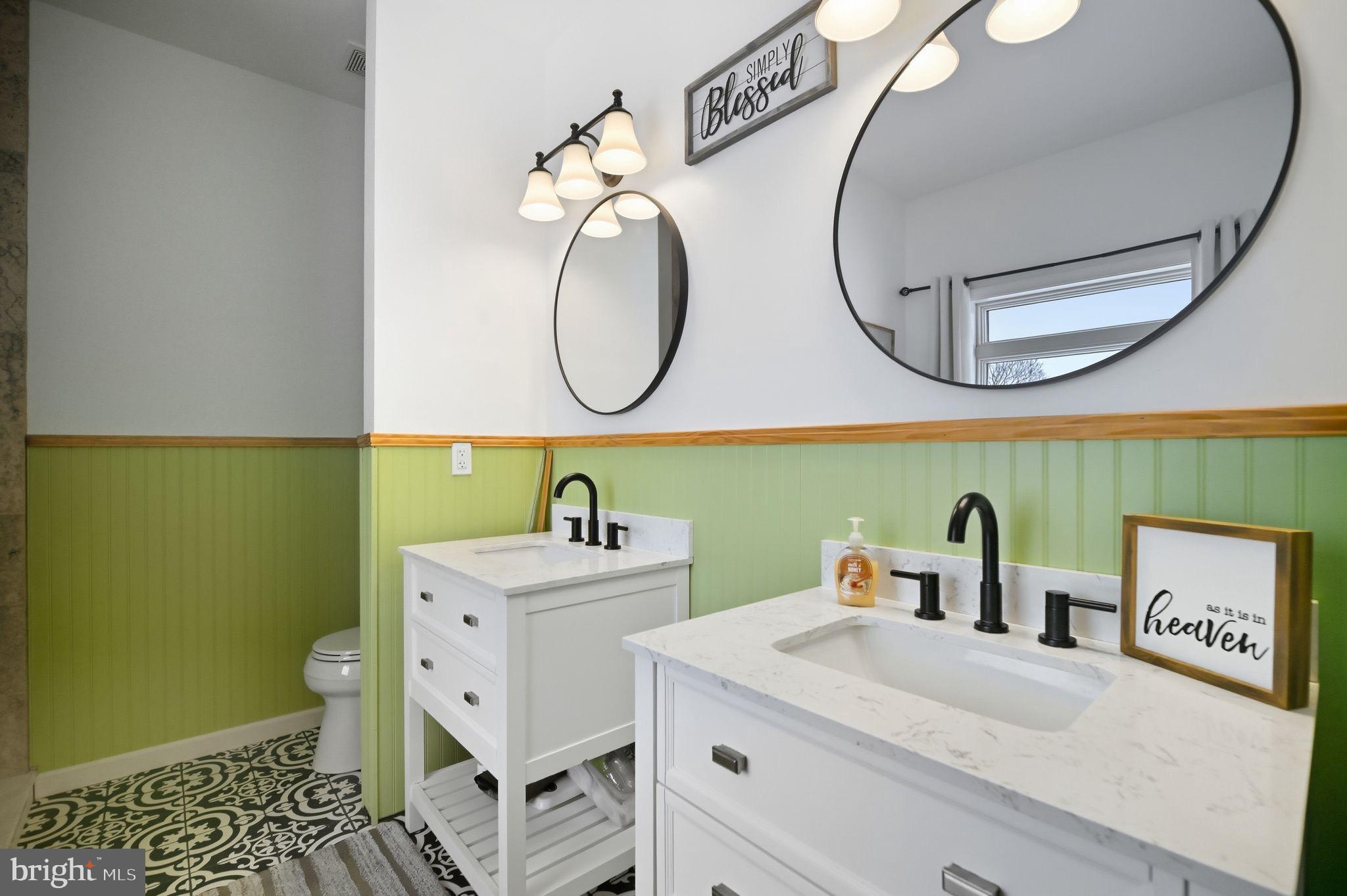 7466 Meadow View Lane Rixeyville, VA 22737 - Photo 21 of 41 Chic bathroom with vibrant green accents.