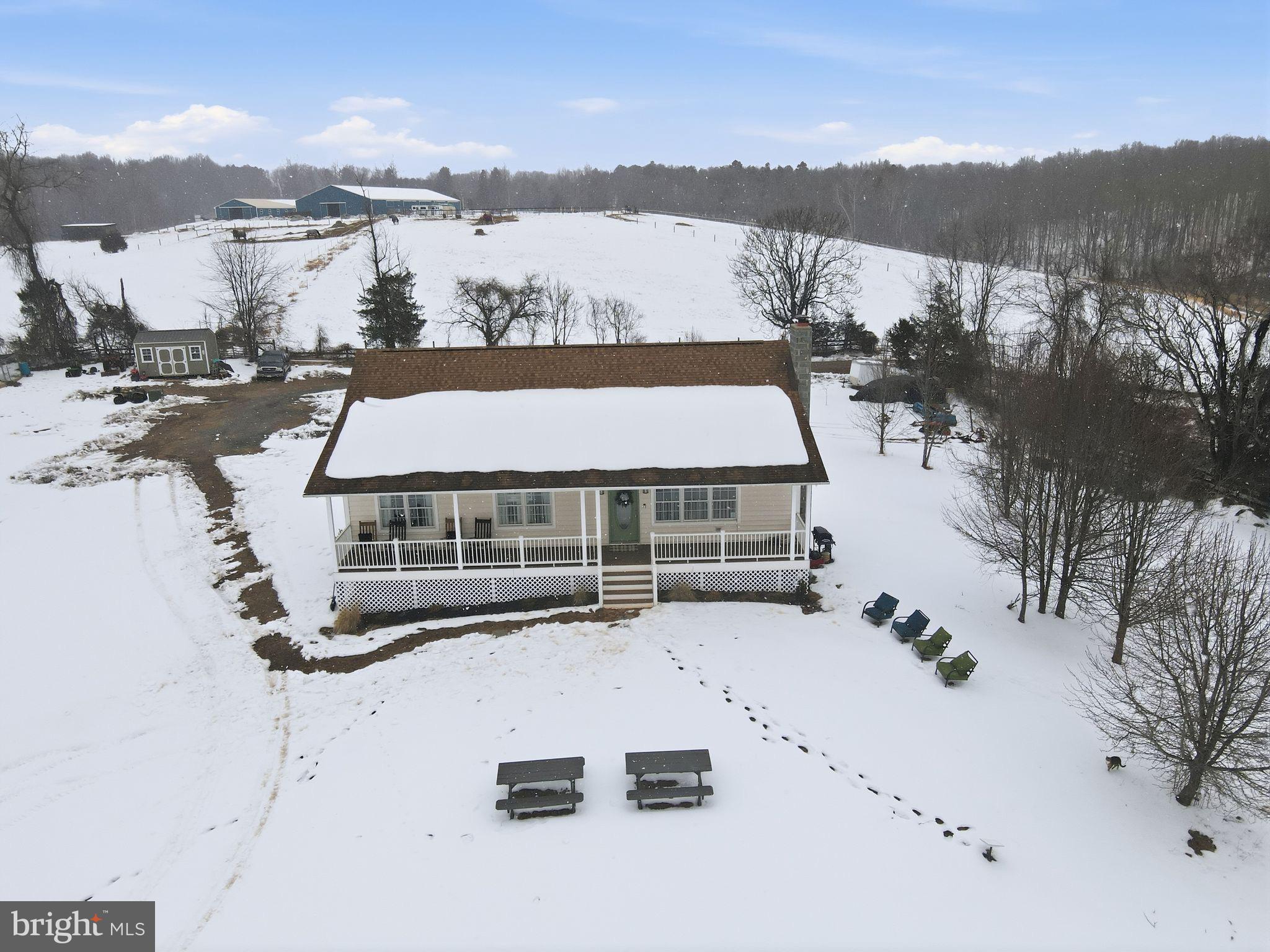 7466 Meadow View Lane Rixeyville, VA 22737 - Photo 35 of 41 Charming home nestled in a snowy landscape.