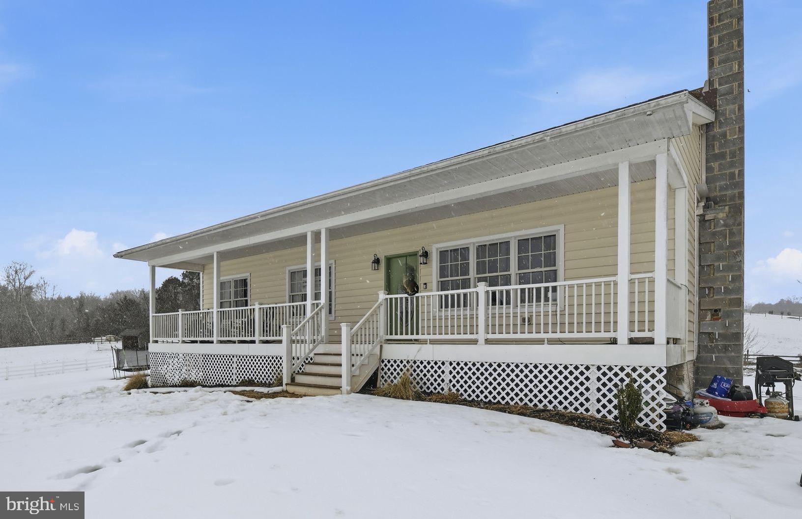 7466 Meadow View Lane Rixeyville, VA 22737 - Photo 38 of 41 Charming home nestled in a snowy landscape.