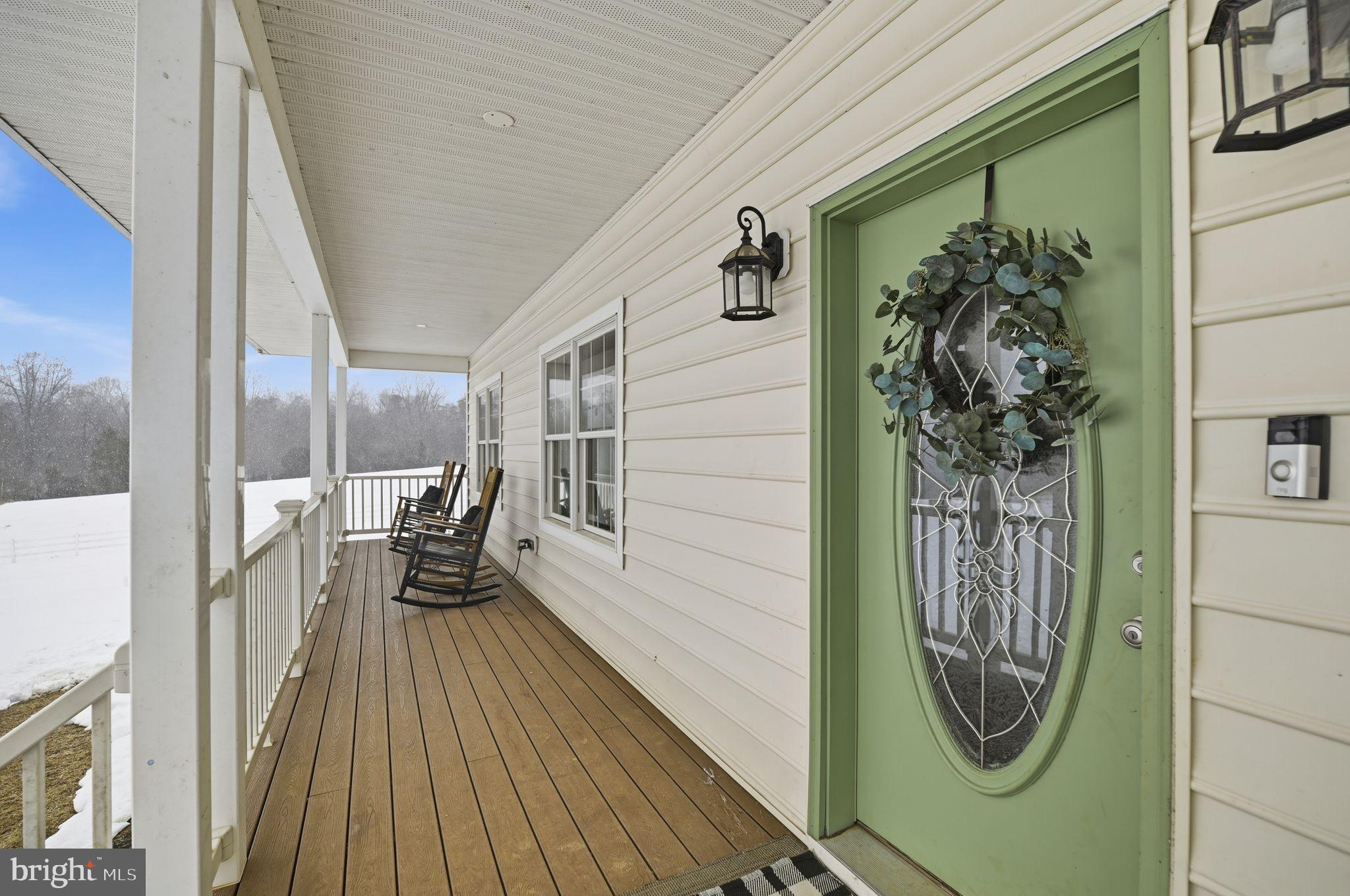 7466 Meadow View Lane Rixeyville, VA 22737 - Photo 4 of 41 Charming porch with inviting green door.