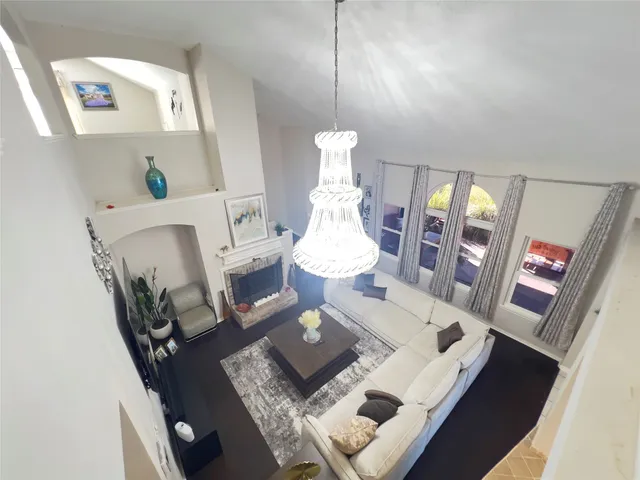 a bedroom with a bed and a table in it