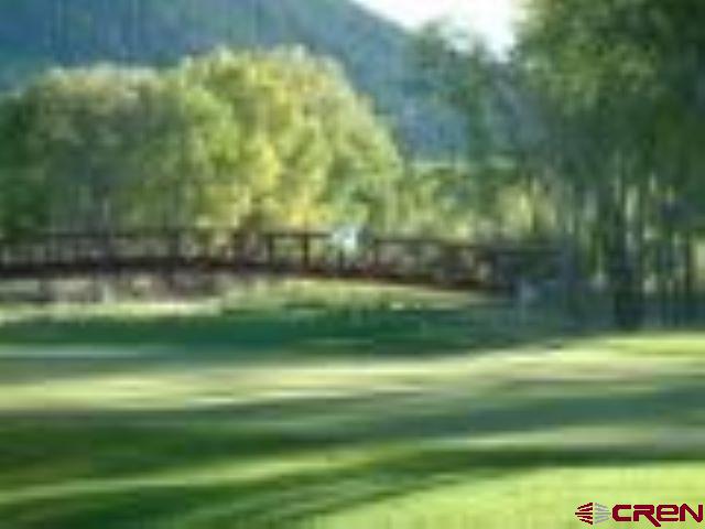 188 West Riverside Court South Fork, CO 81154 - Photo 8 of 10 a view of a yard