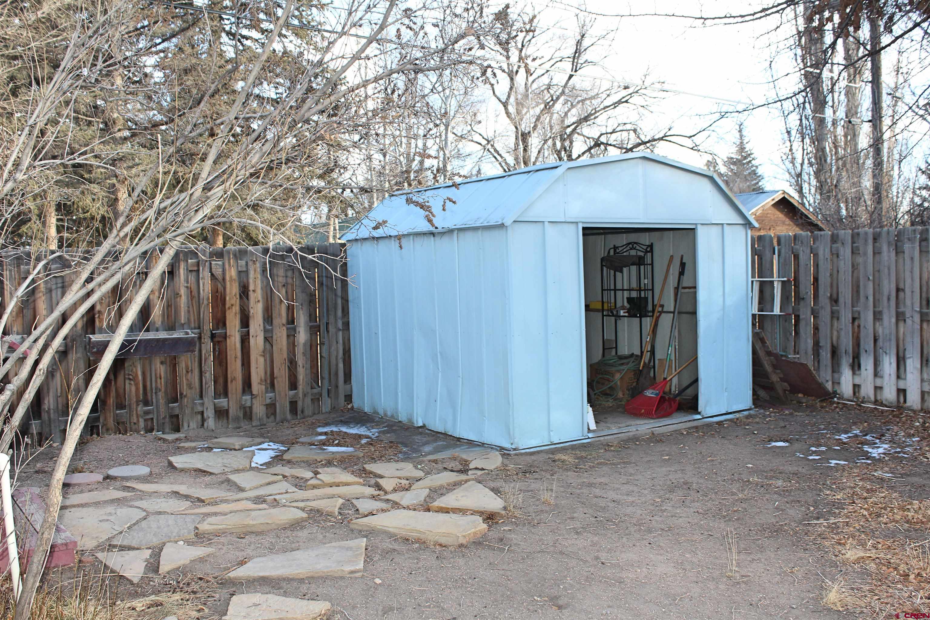 1016 Lincoln Avenue Alamosa, CO 81101 - Photo 10 of 10 a view of a house with backyard