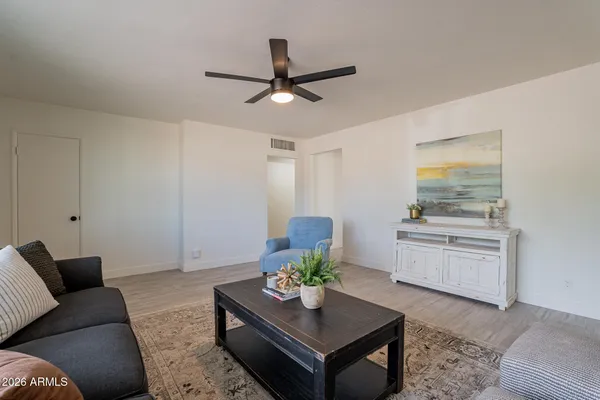 a living room with furniture and a window