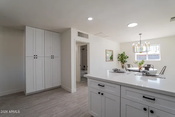 a bathroom with a double vanity sink and mirror