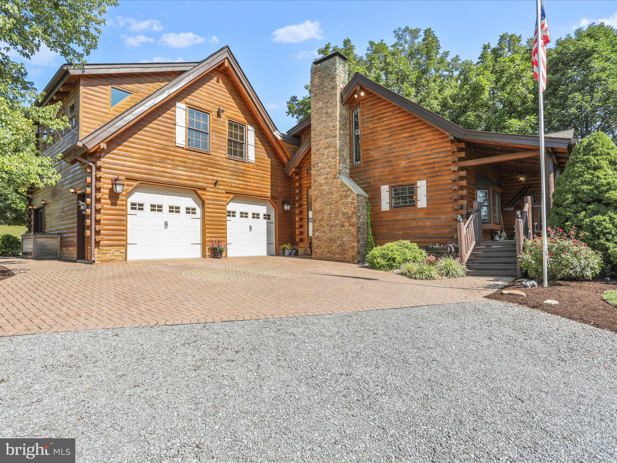 14122 Mercersburg Road Clear Spring, MD 21722 - Photo 62 of 143 a front view of a house with a yard and garage