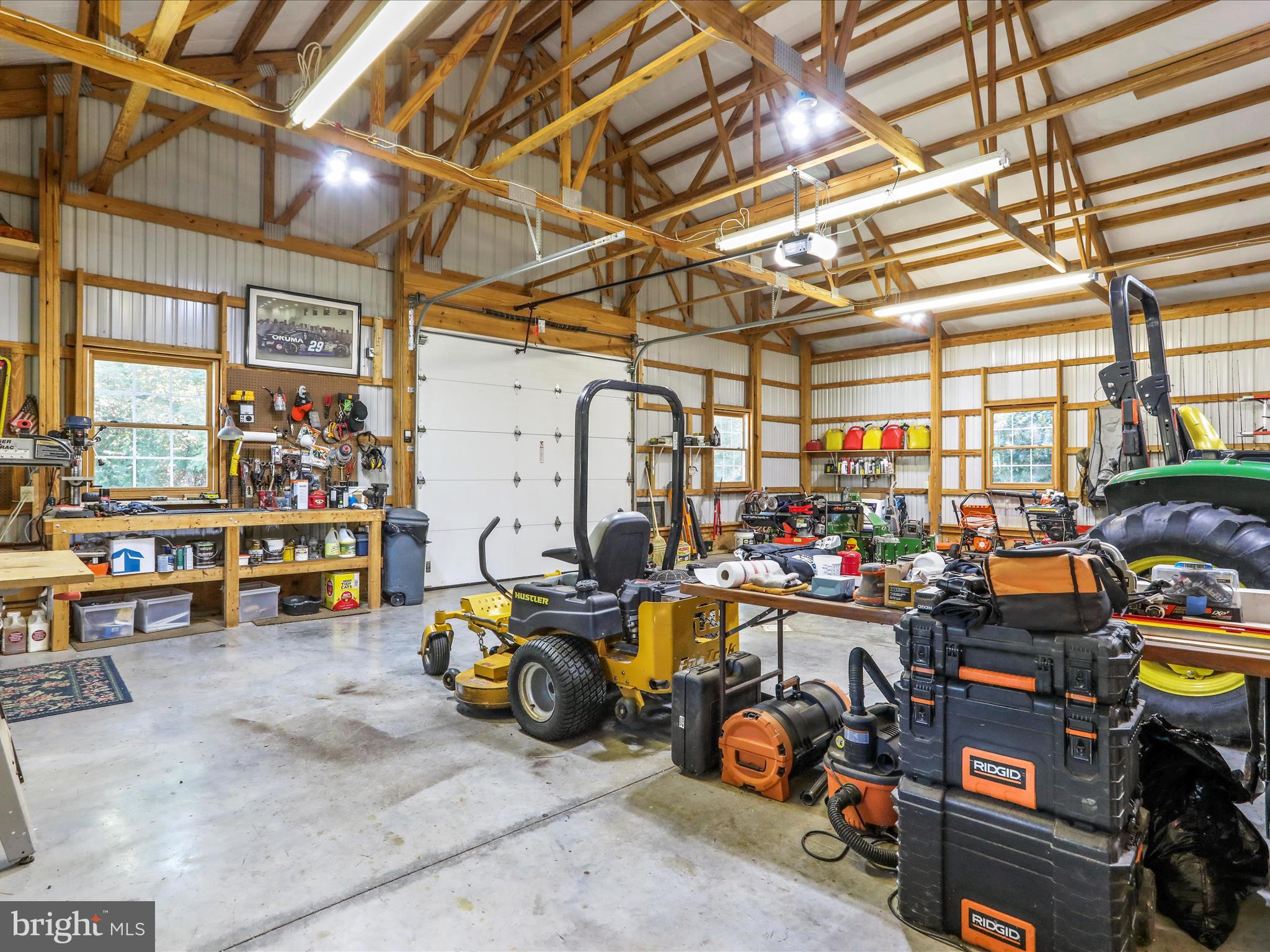 14122 Mercersburg Road Clear Spring, MD 21722 - Photo 85 of 143 a view of a garage with a bike and a car