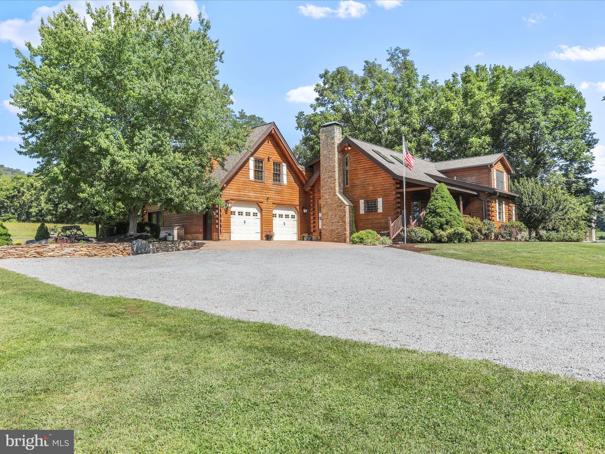 14122 Mercersburg Road Clear Spring, MD 21722 - Photo 96 of 143 a front view of a house with a yard and trees