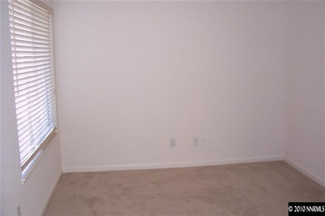 1812 San Jose Court Reno, NV 89521 - Photo 8 of 9 a view of an empty room and a window