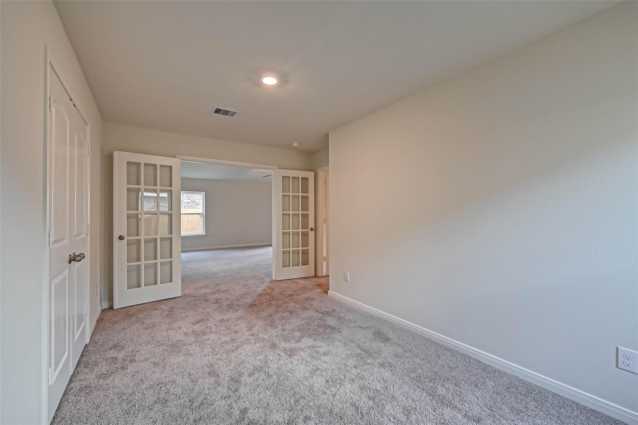 20834 Solstice Point Drive Hockley, TX 77447 - Photo 8 of 16 an empty room with windows
