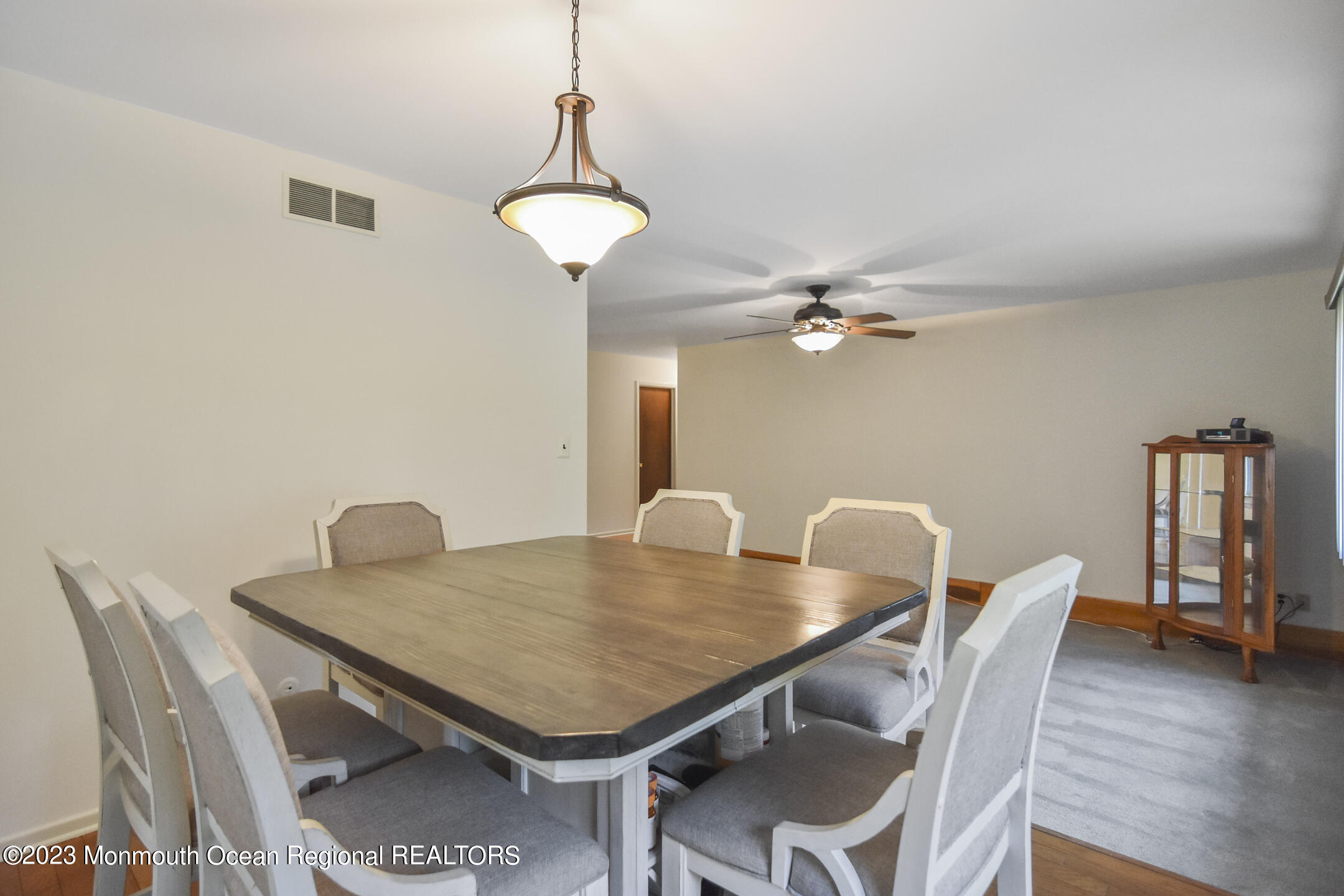 357 Easy Street Howell, NJ 07731 - Photo 11 of 36 a view of a dining room with furniture and wooden floor