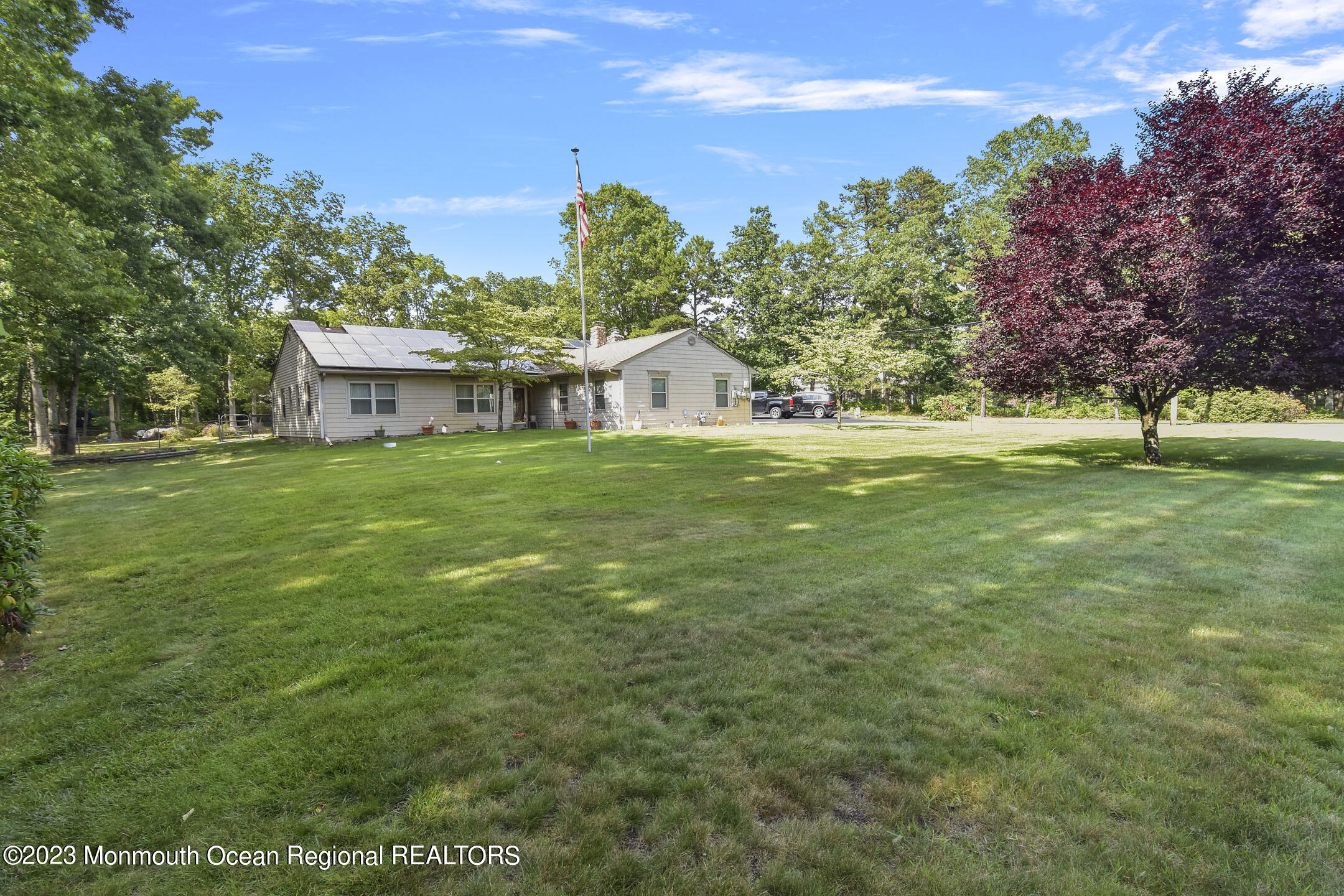 357 Easy Street Howell, NJ 07731 - Photo 3 of 36 a front view of a house with a yard