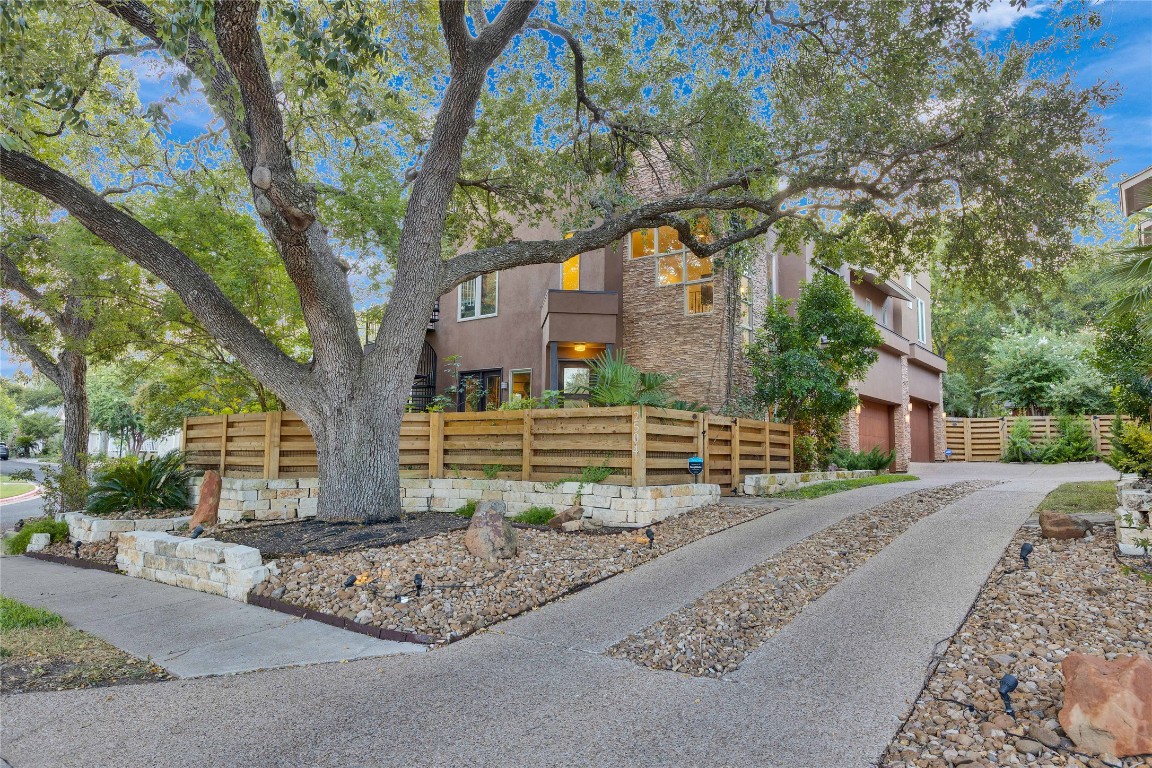 2504 Kinney Road, Unit A Austin, TX 78704 - Photo 1 of 1 a front view of a house with garden