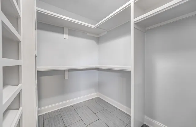 a view of an empty walk in closet