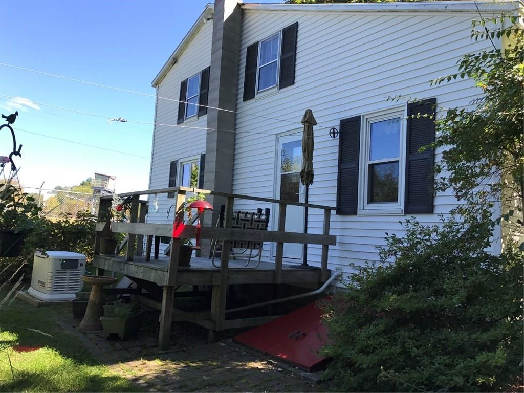 12 Company Road Hollis, ME 04042 - Photo 28 of 33 back porch and new generator which...