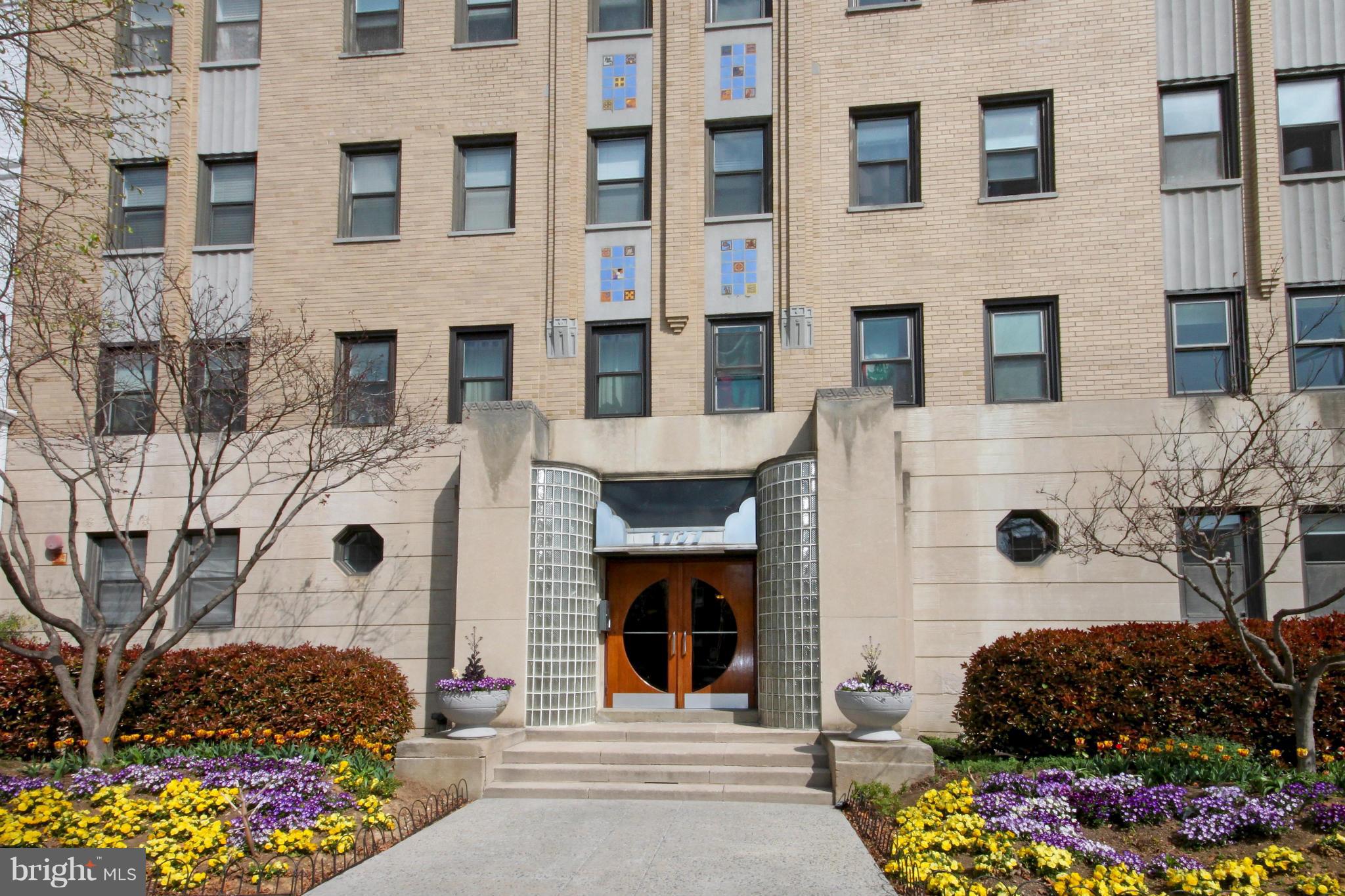 1727 R Street Northwest, Unit 101 Washington, DC 20009 - Photo 1 of 30 a front view of a building with outdoor space