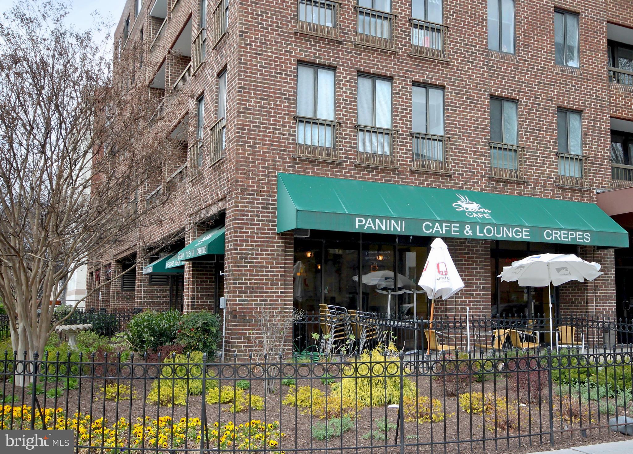 1727 R Street Northwest, Unit 101 Washington, DC 20009 - Photo 27 of 30 a front view of house with yard and outdoor seating