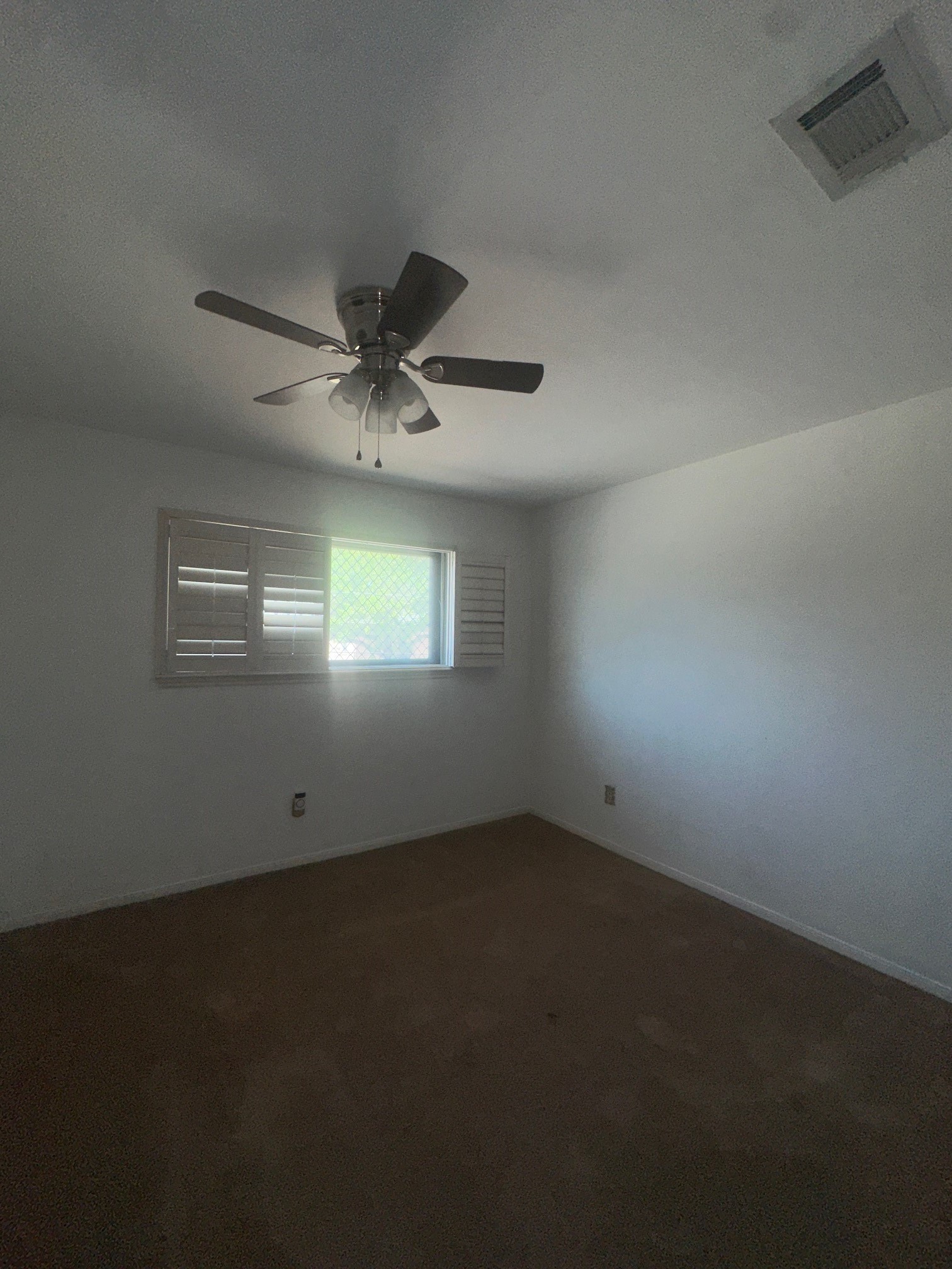 14712 Perthshire Road, Unit A Houston, TX 77079 - Photo 4 of 8 a view of an empty room with a window