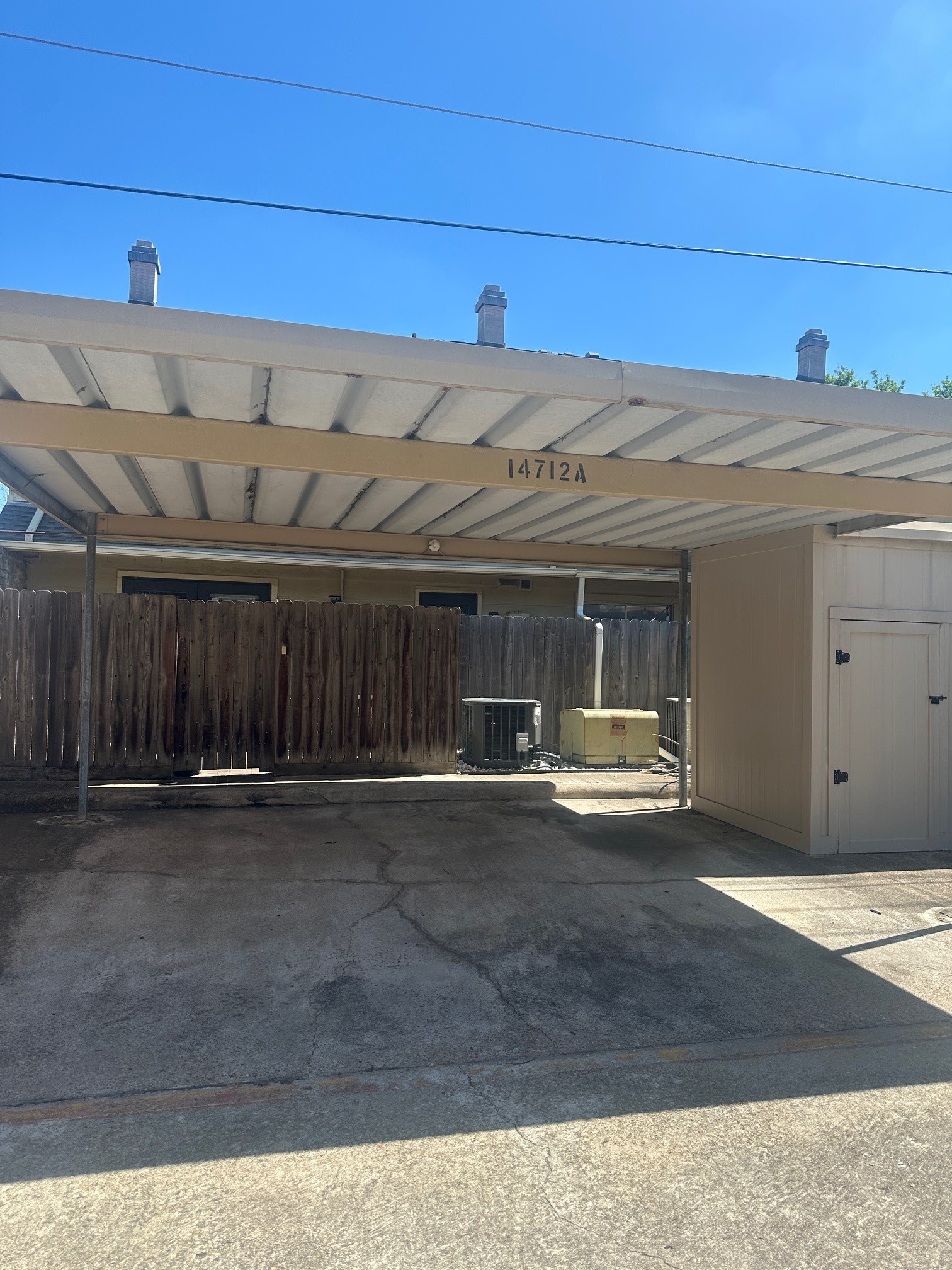 14712 Perthshire Road, Unit A Houston, TX 77079 - Photo 8 of 8 a view of a car garage of the house