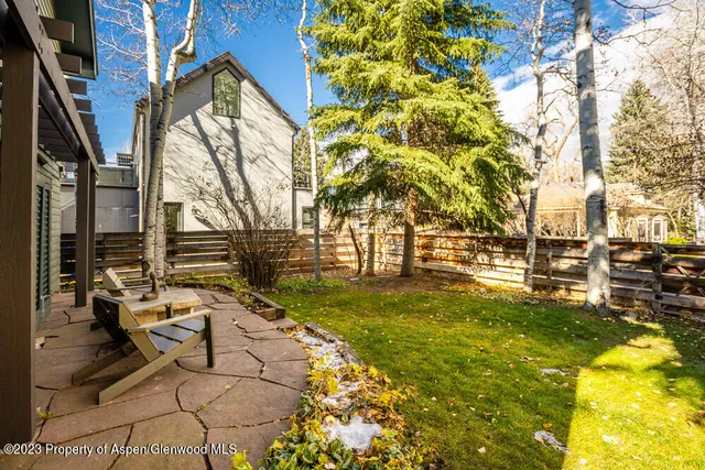 a view of yard with seating space