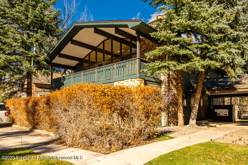 114 East Bleeker Street, Unit 102 Aspen, CO 81611 - Photo 20 of 21 a view of a house with a yard