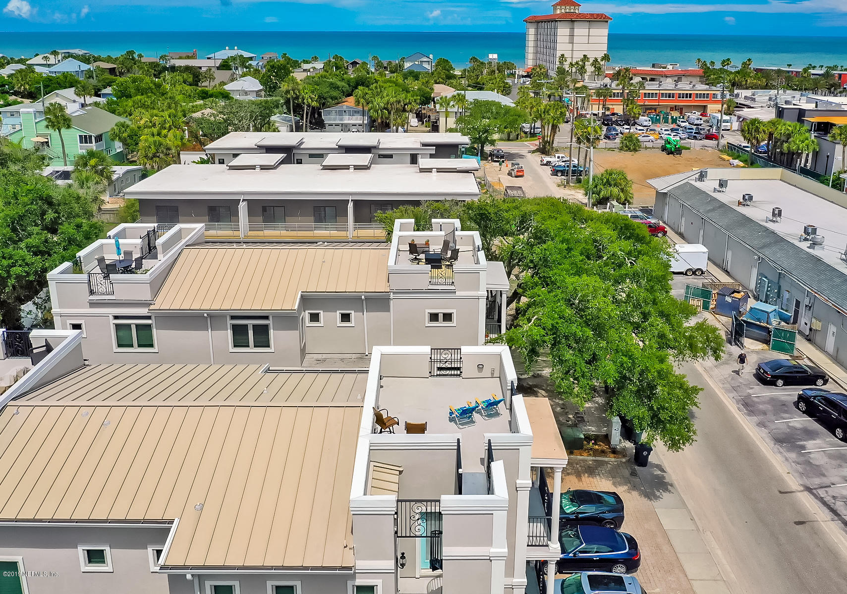 345 Ahern Street Atlantic Beach, FL 32233 - Photo 2 of 44 an aerial view of residential houses with outdoor space