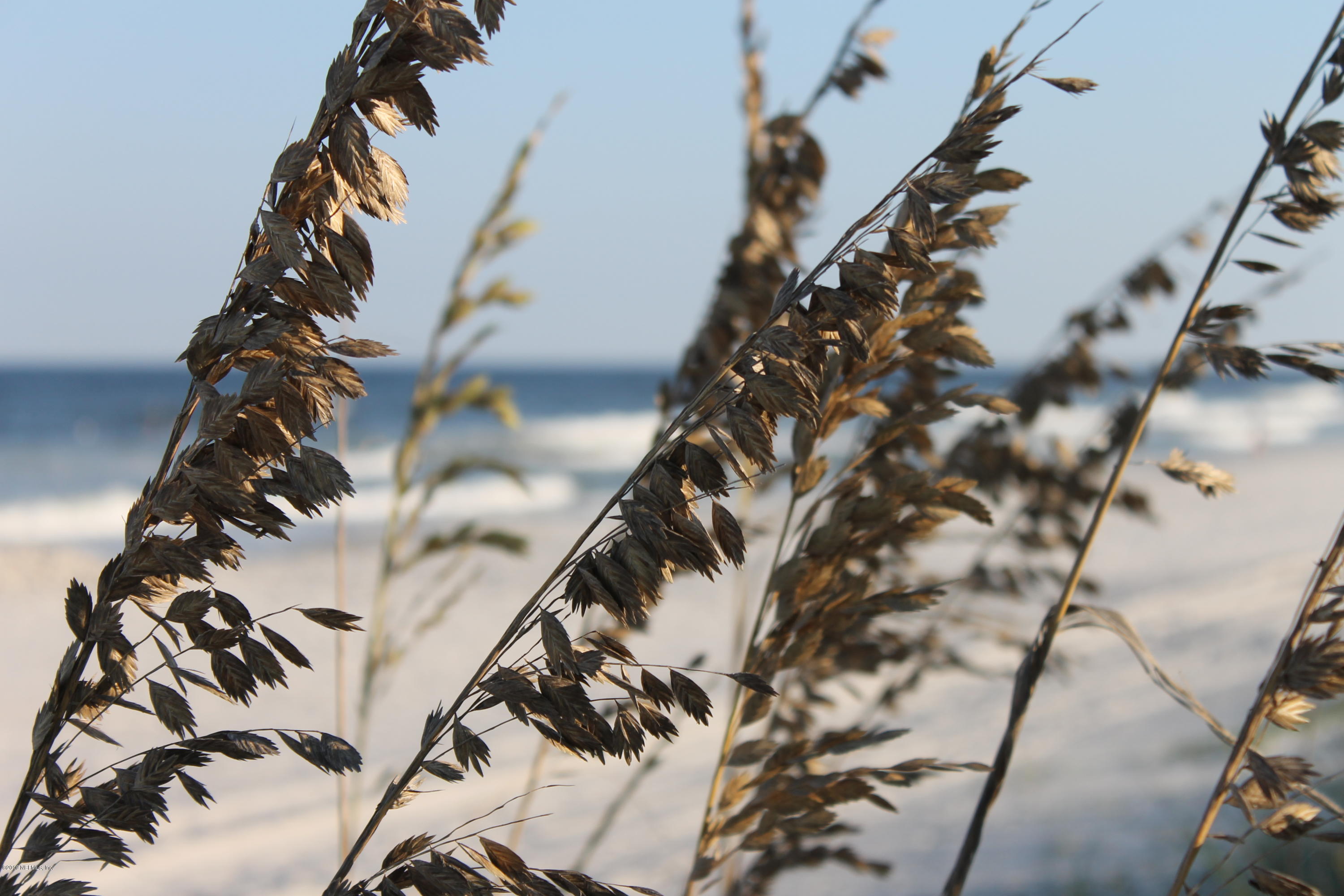 345 Ahern Street Atlantic Beach, FL 32233 - Photo 30 of 44 a view of stairs with wooden floor