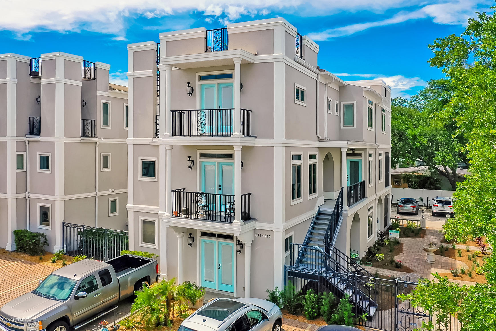 345 Ahern Street Atlantic Beach, FL 32233 - Photo 3 of 44 a front view of a multi story residential apartment building